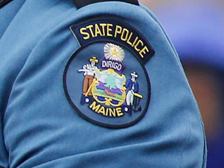 A Maine state trooper shot at a truck approaching the US-Canada border with a sign indicating there was an explosive on board, police say