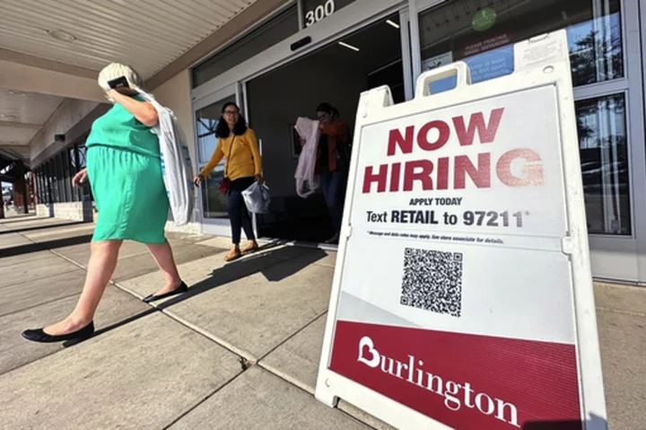 Slightly fewer number of Americans apply for jobless benefits as layoffs remain rare