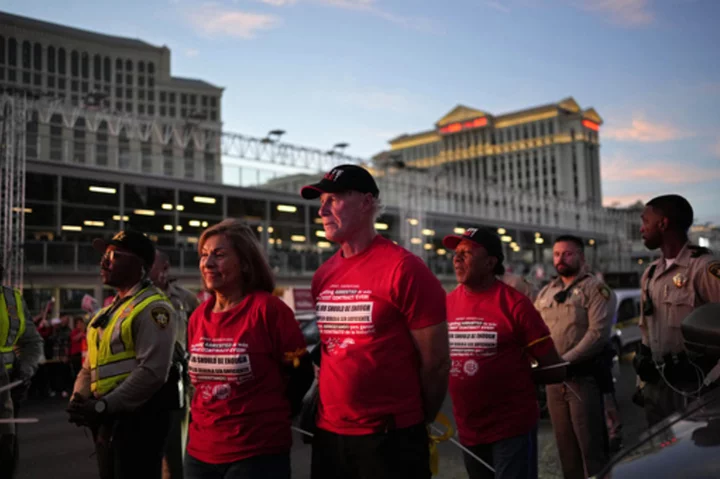 Union workers arrested on Las Vegas Strip for blocking traffic as thousands rally