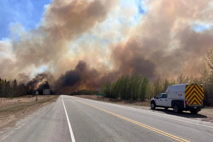 Cooler weather brings some relief to wildfire-hit Canadian oil province Alberta