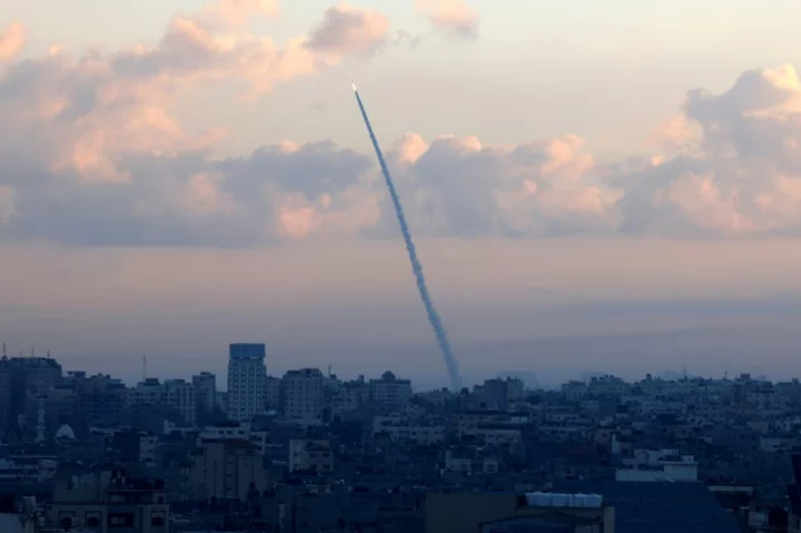 Rocket barrages from Gaza hit Israel, killing at least one